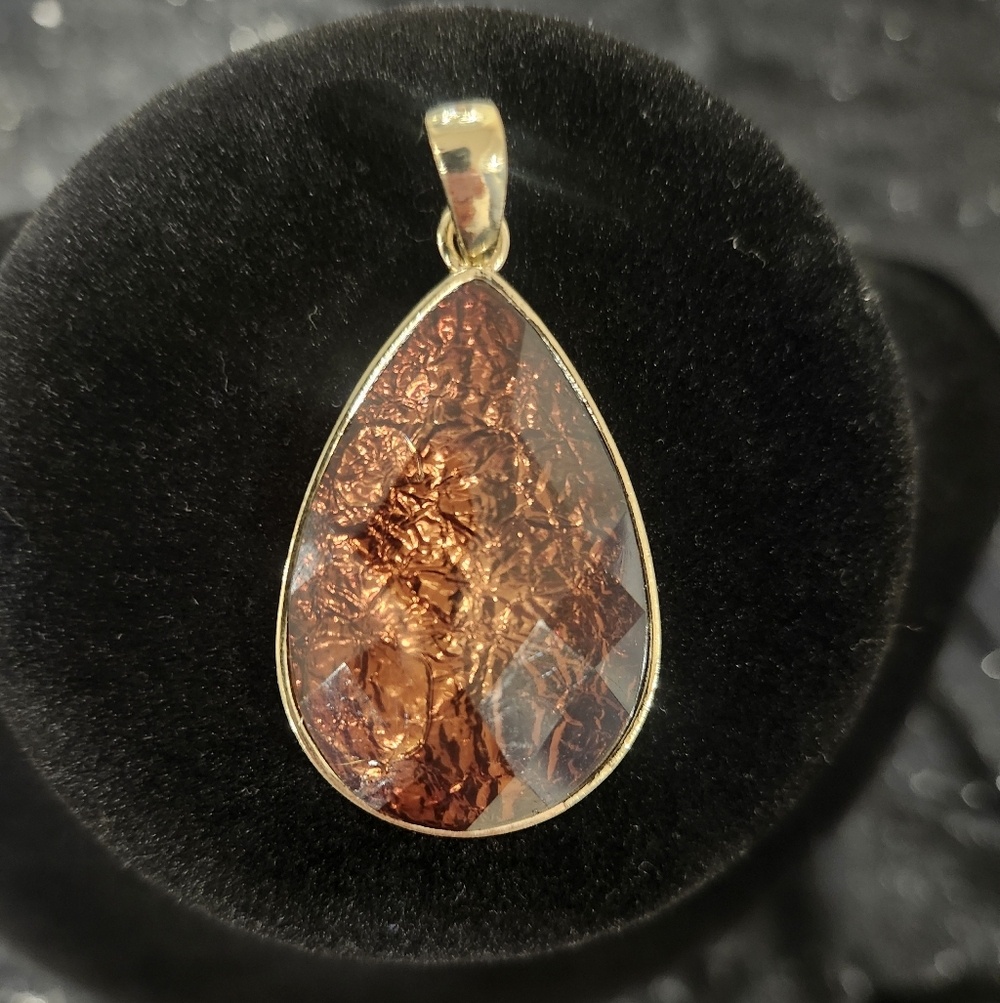 Elegant Gold and Copper Teardrop Pendant